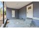Attached carport showing access doors and concrete floor at 2608 Barge Sw Rd, Atlanta, GA 30331