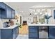 Stylish kitchen with stainless steel appliances and an adjacent living area at 2608 Barge Sw Rd, Atlanta, GA 30331