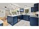 Stylish kitchen with bar seating, quartz countertops, and stainless steel appliances at 2608 Barge Sw Rd, Atlanta, GA 30331