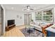 Airy living room with recessed lighting, modern decor, and a large window at 2608 Barge Sw Rd, Atlanta, GA 30331