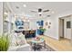 Open-concept living room with modern accents, kitchen bar, and stylish decor at 2608 Barge Sw Rd, Atlanta, GA 30331