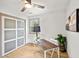 Cozy home office with hardwood floors, natural light, and a decorative sliding door at 2608 Barge Sw Rd, Atlanta, GA 30331