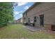 Spacious backyard featuring a well-maintained lawn, ideal for outdoor activities and entertaining at 412 Live Oak Pass, Loganville, GA 30052