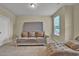 Bedroom featuring carpet, a couch with pillows, and a door leading outside at 412 Live Oak Pass, Loganville, GA 30052