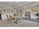 Formal dining room featuring a round wood table and stylish decor at 412 Live Oak Pass, Loganville, GA 30052