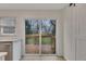 Bright kitchen with access to a wooden deck through sliding glass doors at 2328 Carnes Rd, Jonesboro, GA 30236
