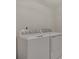 Laundry room features modern appliances, including a washer and dryer set at 2328 Carnes Rd, Jonesboro, GA 30236