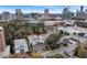 Aerial view of a city apartment building, surrounded by trees and city skyscrapers at 3649 Peachtree Ne Rd # 201, Atlanta, GA 30319