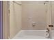 Classic bathroom featuring a shower-tub combo with neutral tiling and fixtures at 3649 Peachtree Ne Rd # 201, Atlanta, GA 30319