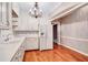 Bright kitchen features lots of white cabinets, stainless steel sink, and wood floors at 3649 Peachtree Ne Rd # 201, Atlanta, GA 30319