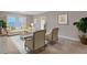 Bright living room with neutral walls, comfortable seating, and a light blue area rug at 3649 Peachtree Ne Rd # 201, Atlanta, GA 30319