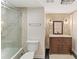 Bathroom featuring a glass shower, modern vanity, and sconce lighting at 1266 Creekside Se Ter, Smyrna, GA 30082