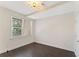 Bright bedroom featuring new flooring, a window, and neutral paint at 1266 Creekside Se Ter, Smyrna, GA 30082