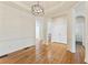 Open entryway with hardwood floors, white trim, archways, and natural light at 1266 Creekside Se Ter, Smyrna, GA 30082