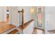 Welcoming foyer with hardwood floors, decorative glass door, and staircase leading to the upper level at 1266 Creekside Se Ter, Smyrna, GA 30082
