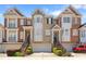 Charming townhomes featuring brick facade, individual garages, and manicured landscaping in a desirable neighborhood at 1266 Creekside Se Ter, Smyrna, GA 30082