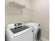Bright laundry room with modern washer and dryer at 1266 Creekside Se Ter, Smyrna, GA 30082