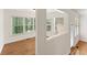 Bright sunroom with hardwood floors, white trim, and view to the backyard at 1266 Creekside Se Ter, Smyrna, GA 30082