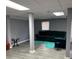 Spacious finished basement with gray walls and hardwood floors; perfect for entertaining at 4701 Flat Shoals Rd # 37E, Union City, GA 30291