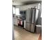 Kitchen features white cabinets and stainless steel appliances and fixtures at 4701 Flat Shoals Rd # 37E, Union City, GA 30291
