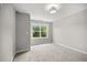 Cozy bedroom boasts natural light and a relaxing view at 1101 Cooks Farm Way, Woodstock, GA 30189