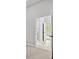 Neutral bedroom with carpet and view into the Primary bathroom at 1101 Cooks Farm Way, Woodstock, GA 30189