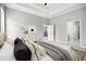 Relaxing main bedroom features tray ceiling and an attached bathroom at 1101 Cooks Farm Way, Woodstock, GA 30189