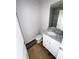 Bathroom featuring a modern vanity with a granite countertop and a toilet at 11620 E Lovejoy Rd, Hampton, GA 30228