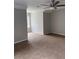 Spacious bedroom featuring a ceiling fan and window at 1200 Larson Sw Ln, Marietta, GA 30064