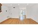 Spacious open-concept room with hardwood floors and access to a private outdoor area at 136 Peachtree Memorial Nw Dr # Nj2, Atlanta, GA 30309