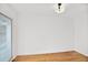 Bright room with hardwood floors and a sliding glass door to the outdoors at 136 Peachtree Memorial Nw Dr # Nj2, Atlanta, GA 30309