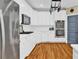 Well-equipped kitchen featuring white cabinetry, stainless steel appliances, and subway tile backsplash at 1477 Edenham Ln, Cumming, GA 30041