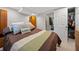 Bedroom featuring a bed, closet, and dresser for storage and comfort at 1728 N Holly Ne Ln, Atlanta, GA 30329