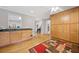 Bright dining area with built-in storage cabinets, hardwood floors, and natural light at 1728 N Holly Ne Ln, Atlanta, GA 30329