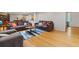 Comfortable living room features hardwood floors, neutral paint, and cozy seating arrangement at 1728 N Holly Ne Ln, Atlanta, GA 30329