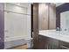 Beautiful bathroom with vanity with sink, tile floors, shower and tub at 22 Moda Ln, Atlanta, GA 30316