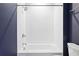 Clean bathroom featuring a tub with white tile surround and a shower head fixture at 22 Moda Ln, Atlanta, GA 30316