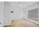 Neutral bedroom with carpet, large windows with blinds, recessed lighting and double closets at 22 Moda Ln, Atlanta, GA 30316