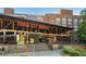 Exterior view of Ponce City Market, featuring brick architecture, pedestrian access, and clear signage at 22 Moda Ln, Atlanta, GA 30316