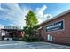 Exterior view of Krog Street Market and The Merchant, with brick facade and clear signage at 22 Moda Ln, Atlanta, GA 30316