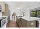 Bright, modern kitchen with stainless steel appliances, sleek cabinets, and hardwood floors at 22 Moda Ln, Atlanta, GA 30316