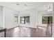 Open-concept space featuring lots of natural light and sleek hardwood flooring at 22 Moda Ln, Atlanta, GA 30316