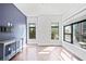 Bright living room featuring hardwood floors and a view of the outdoors at 22 Moda Ln, Atlanta, GA 30316
