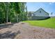 Expansive backyard with well-manicured lawn, patio and a fire pit area perfect for outdoor gatherings at 2861 Digna Ct, Acworth, GA 30101