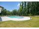 Community pool with lounge chairs and a fenced perimeter at 2861 Digna Ct, Acworth, GA 30101