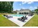 Resort-style community pool featuring lounge chairs and nearby pavilion at 2861 Digna Ct, Acworth, GA 30101