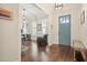 Inviting foyer with hardwood floors and stylish decor that flows into the living area at 2861 Digna Ct, Acworth, GA 30101