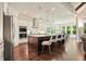 Gourmet kitchen with modern appliances, large island with seating, and open to the living area at 2861 Digna Ct, Acworth, GA 30101