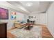 Cozy living room with neutral walls, hardwood floors, and an area rug provides a comfortable space at 2861 Digna Ct, Acworth, GA 30101