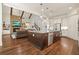 Open concept kitchen and living room with hardwood floors and fireplace at 2861 Digna Ct, Acworth, GA 30101